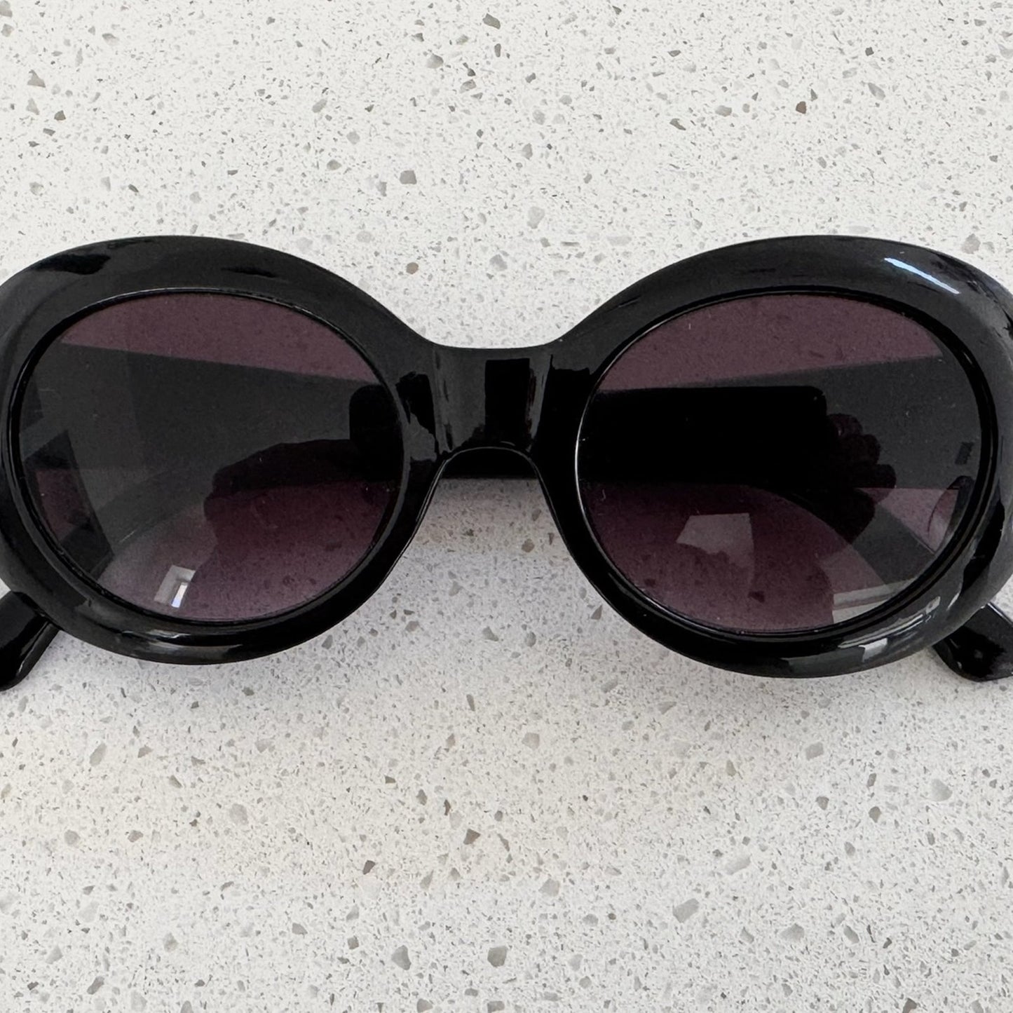 Oscar de la Renta Black Oval Sunglasses Purple Lenses